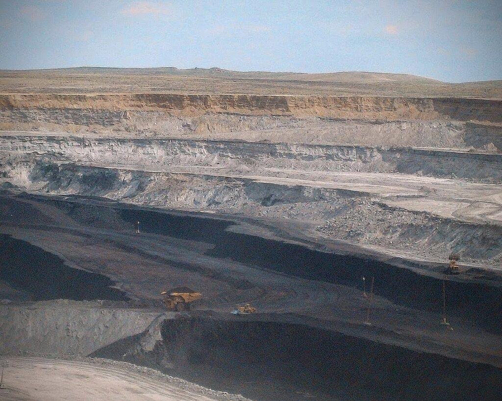 An open cast mine showing the deep coal seam